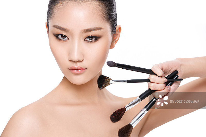 年轻女人化妆图片素材