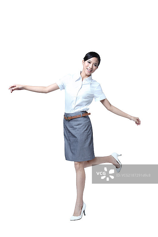 跳跃的商务女人图片素材