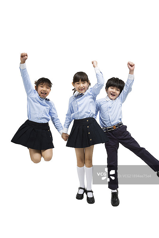 小朋友举手跳跃图片素材