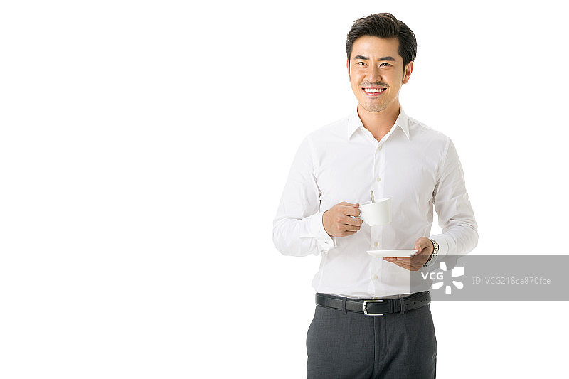 端着茶杯的商务男士图片素材