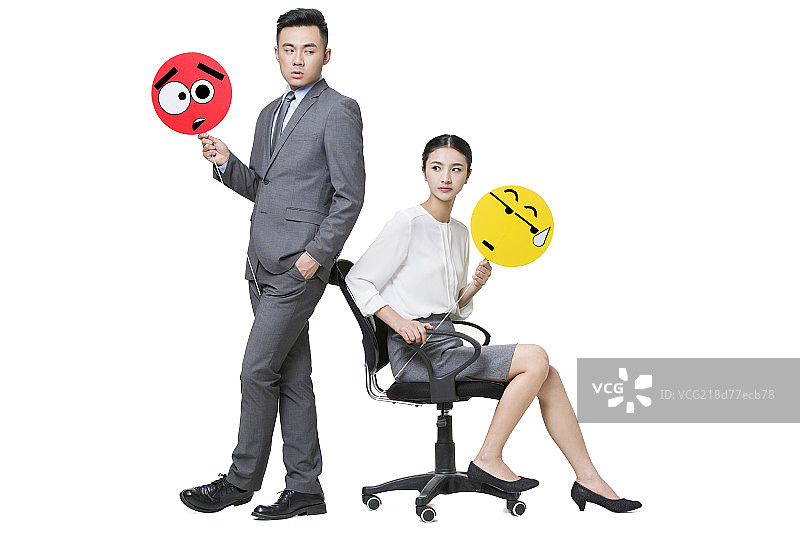 商务人士拿着表示汗颜和窘迫的卡通脸图片素材