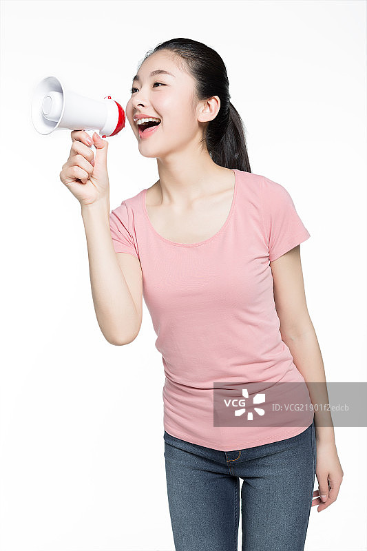少女单手拿喇叭图片素材