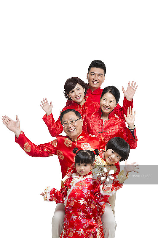 棚拍节日气氛中的唐装一家人团聚图片素材