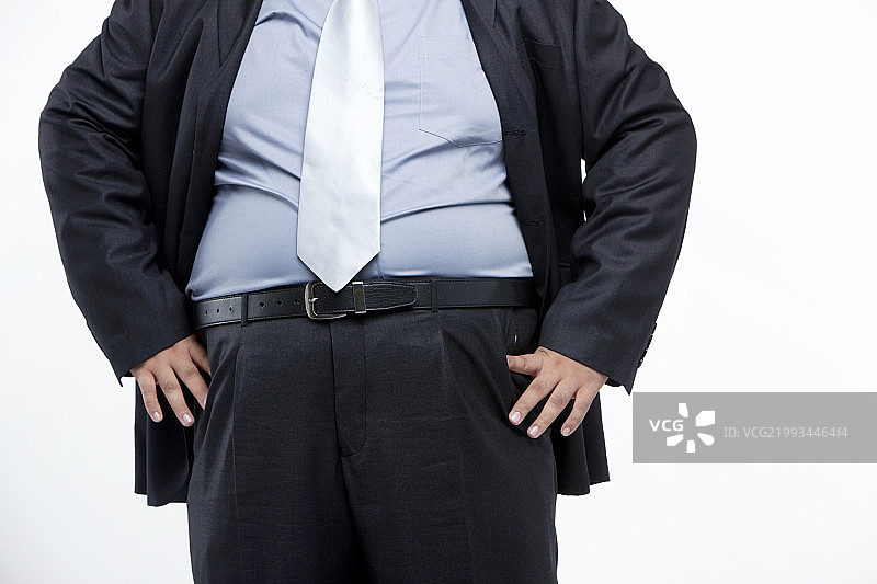 白背景前的胖子图片素材