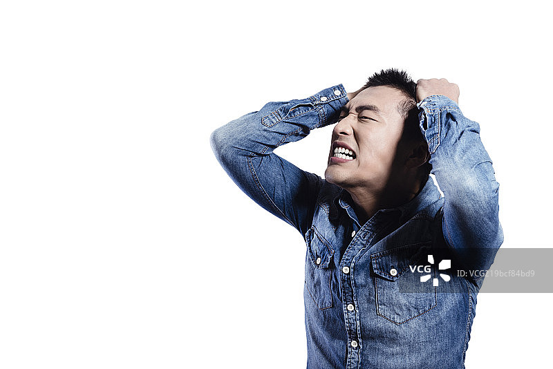 Portrait of aggressive young man图片素材