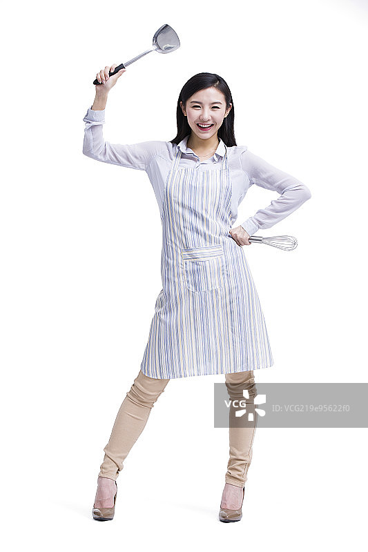 年轻女孩下厨图片素材