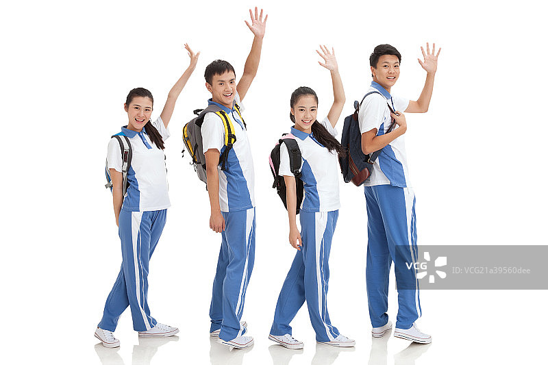 中学生背着书包上学图片素材