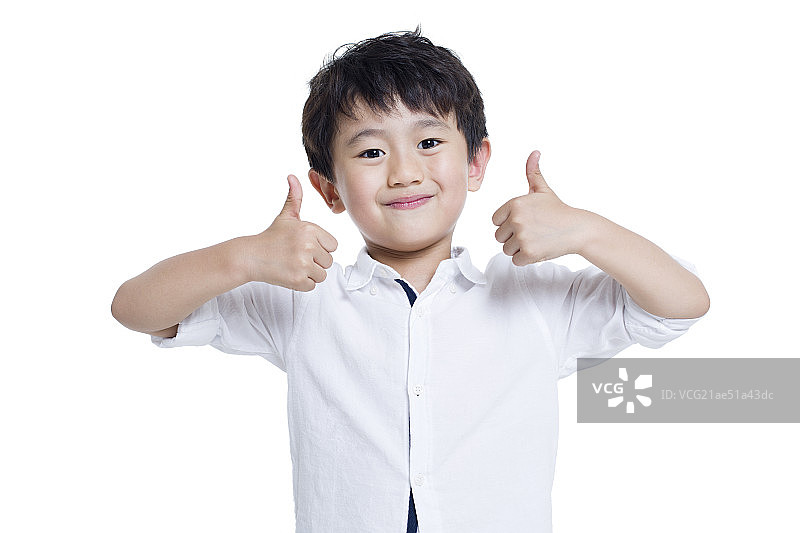 快乐的男孩竖起大拇指图片素材