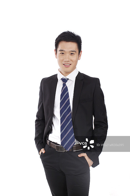 一个双手插兜的商务男士图片素材