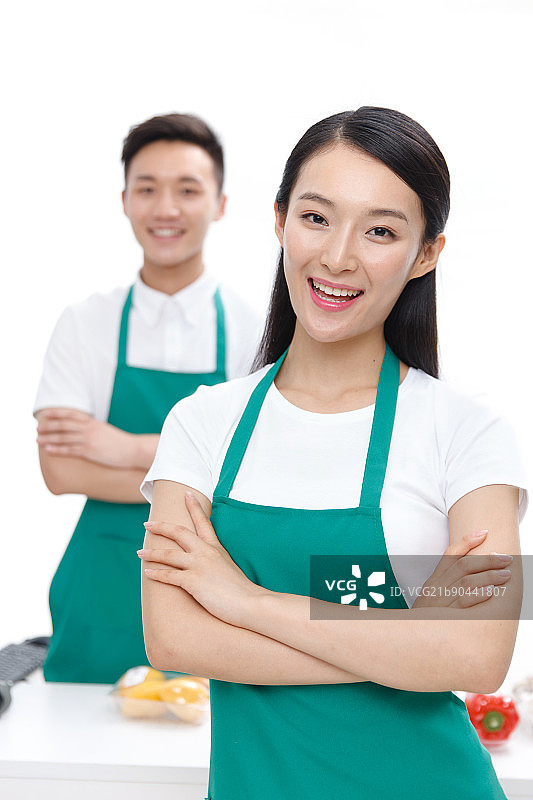 自信的青年收银员图片素材