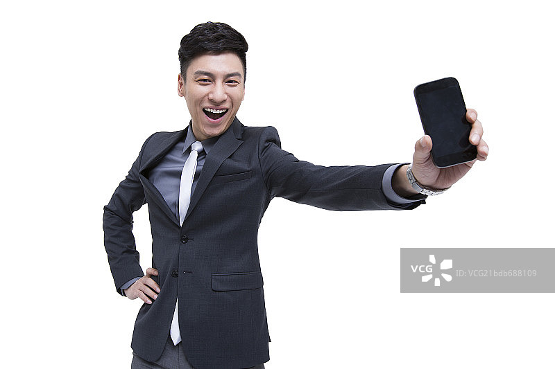 商务男士与智能手机图片素材