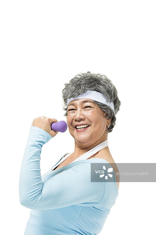 举哑铃的老年人图片素材