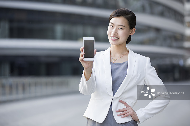 商务女士展示手机图片素材