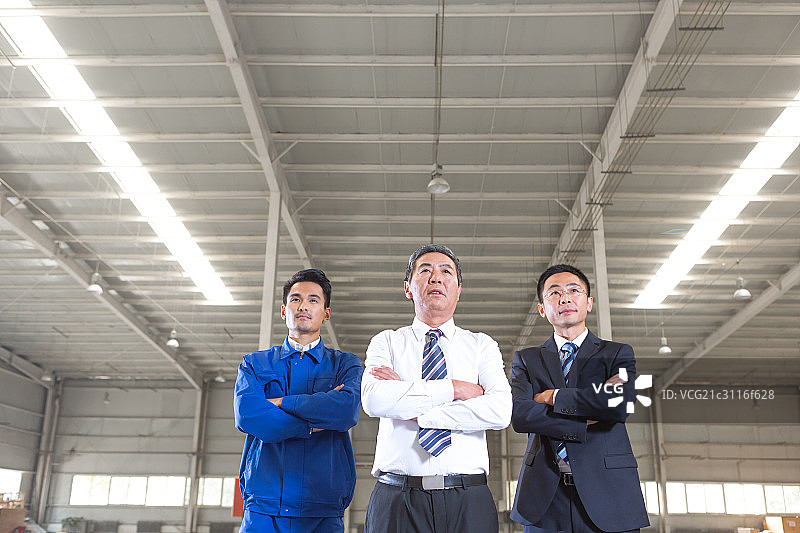 商务人士和工厂工人图片素材