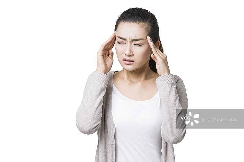 年轻女子头疼图片素材
