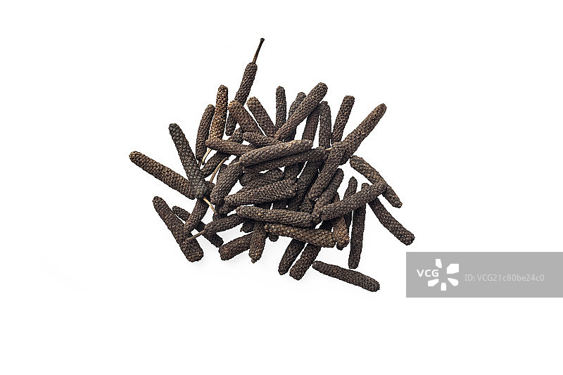 放在桌子上的荜拨图片素材