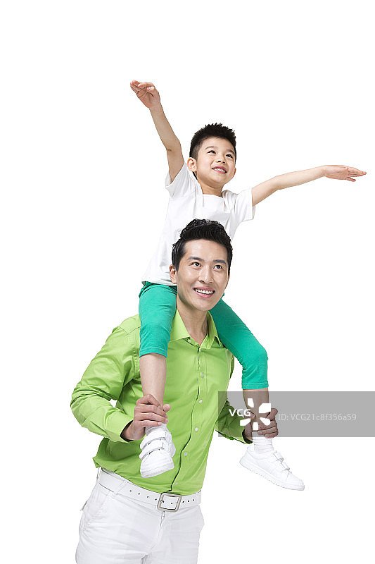 棚拍绿衣年轻人和男童图片素材