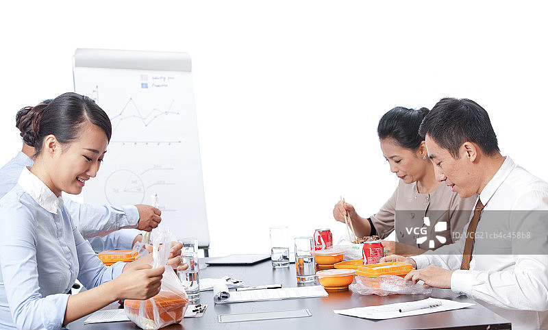 商务人士吃工作餐图片素材