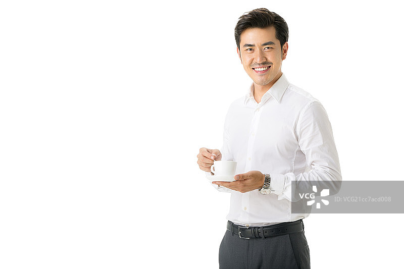 端着茶杯的商务男士图片素材