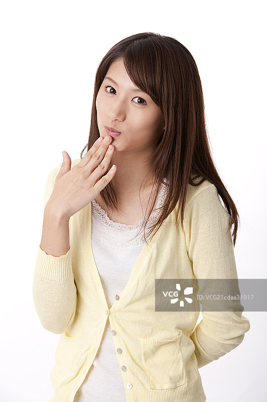 手在下巴,青年女人图片素材