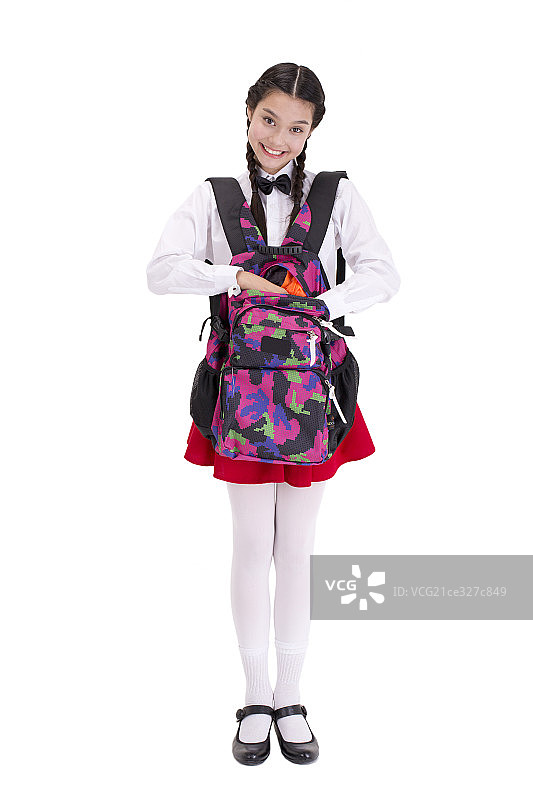 抱着书包的小学生图片素材