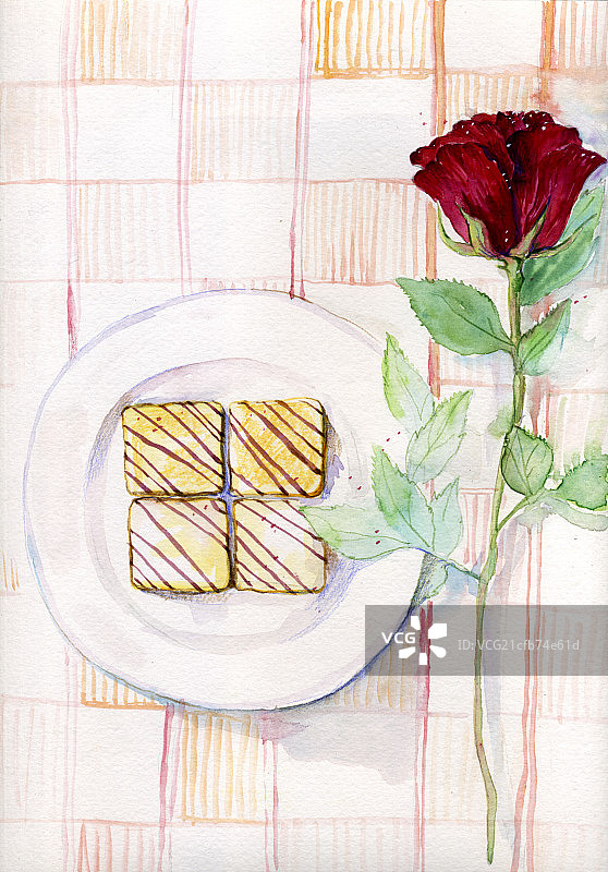 格子布餐盘饼干与单支红玫瑰图片素材