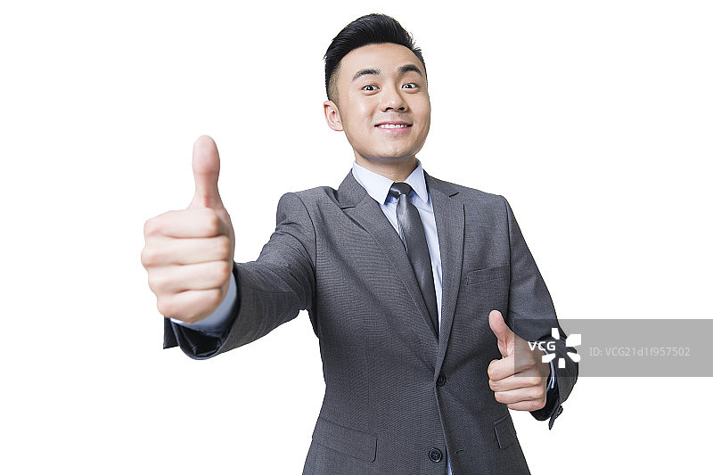 年轻商务男士竖起大拇指图片素材