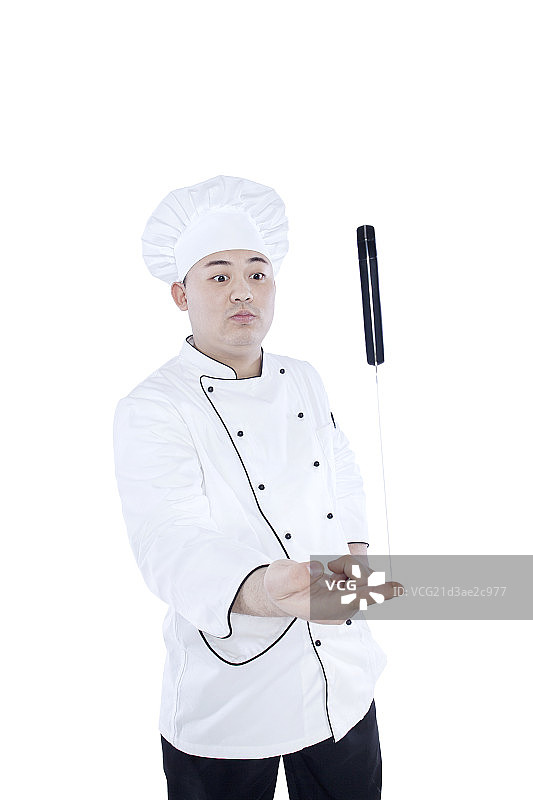 手拿刀的厨师图片素材