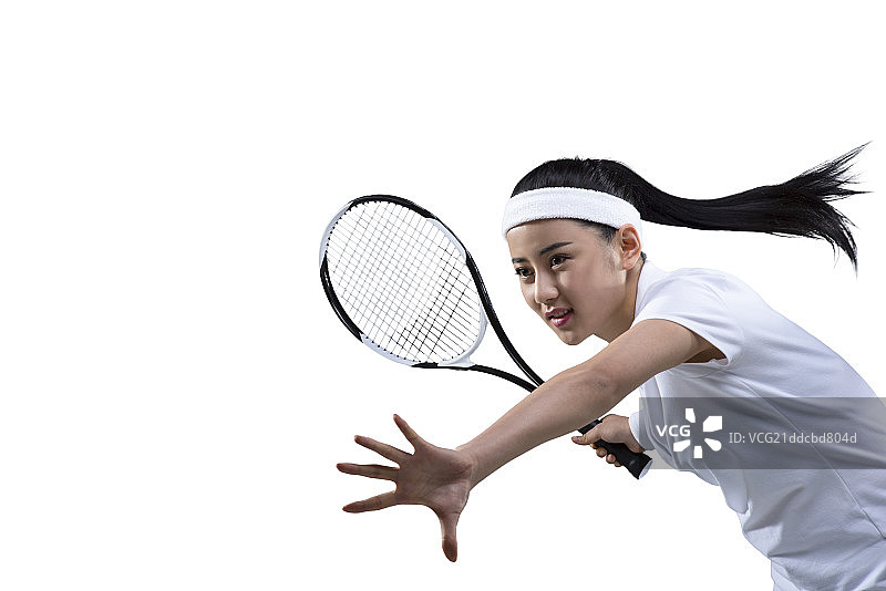 Female tennis player ready to hit ball, portrait图片素材