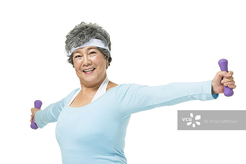 举哑铃的老年人图片素材