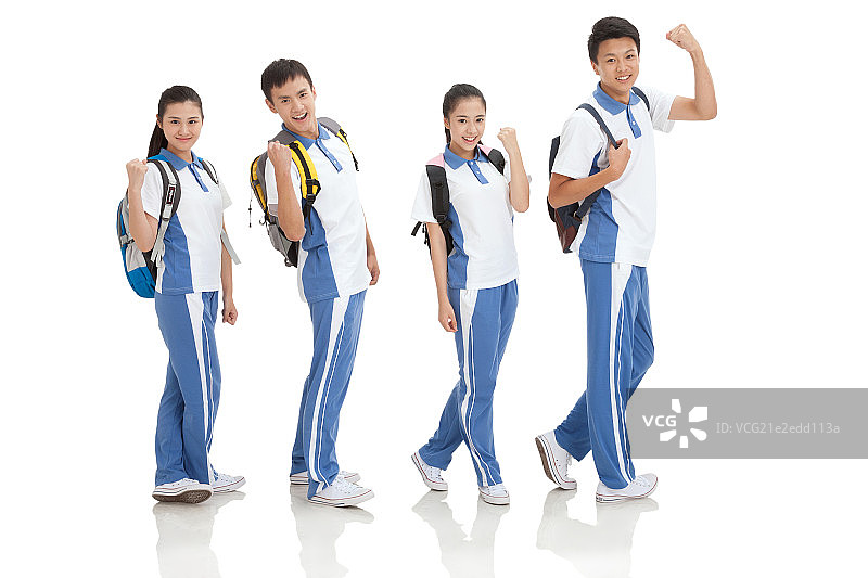 中学生背着书包做手势图片素材