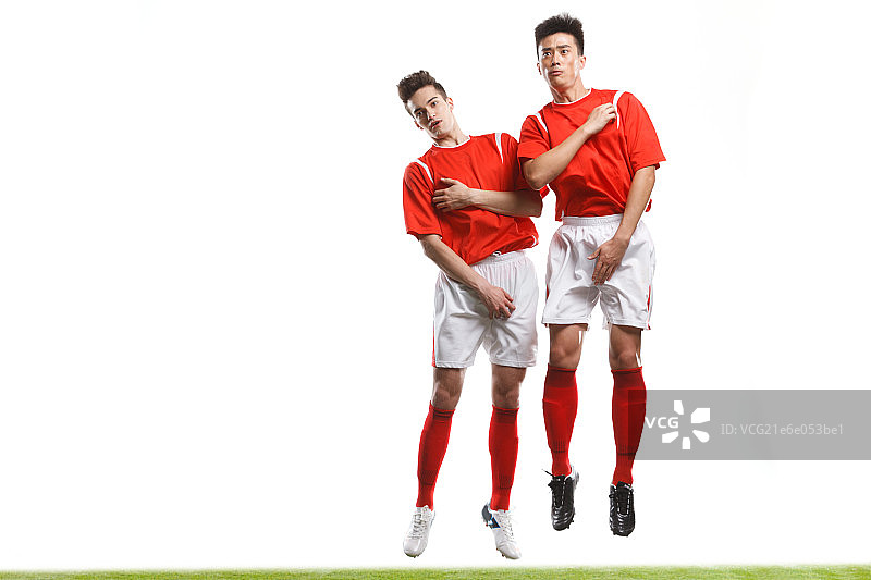 足球运动员跳跃图片素材