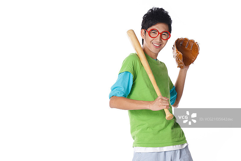时尚活力的年轻男孩打棒球图片素材