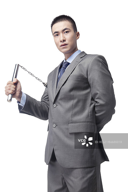 穿西装练武的商业男士图片素材