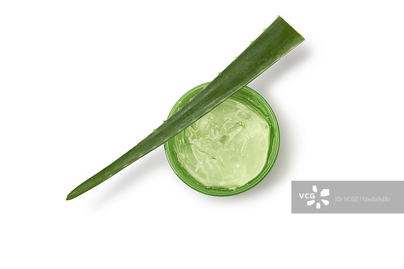 放在桌上子上的芦荟和芦荟胶图片素材