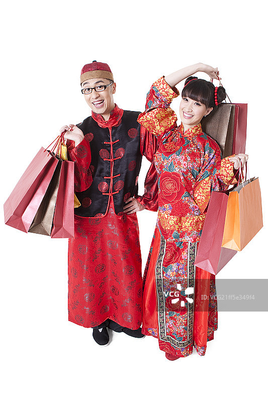 穿着唐装的情侣购物图片素材