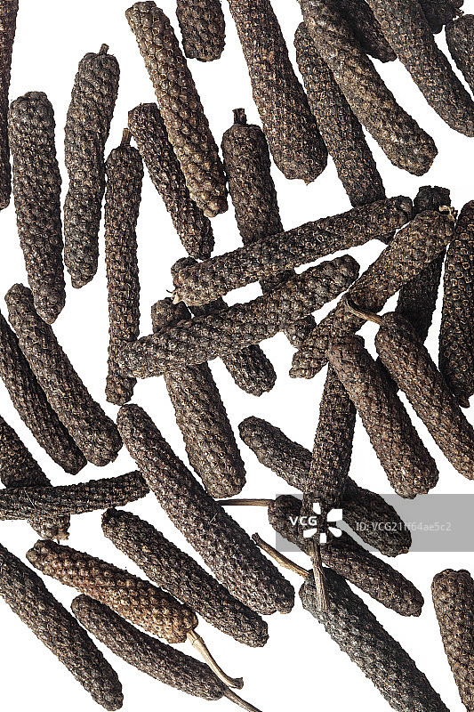 放在桌子上的荜拨图片素材