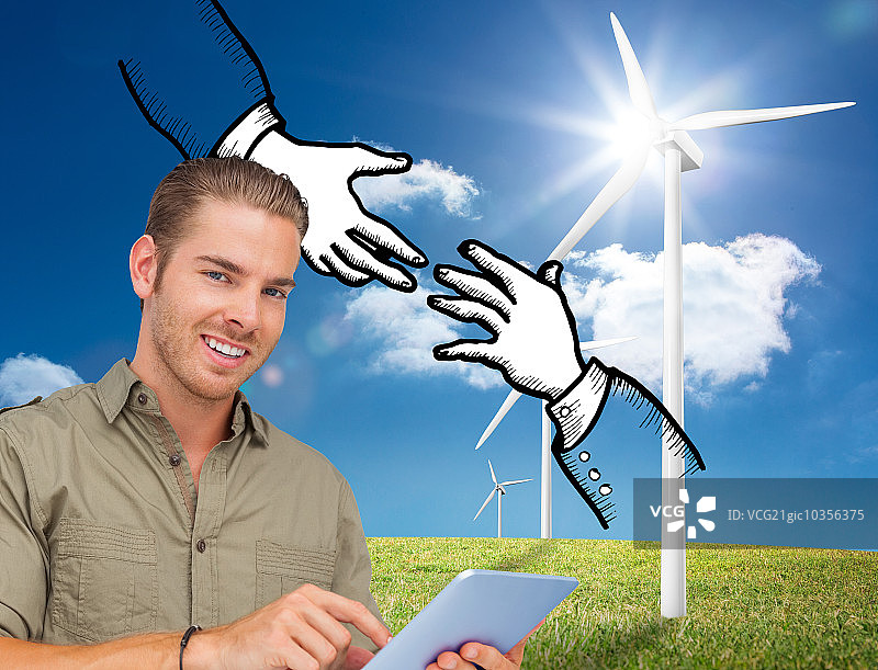 竖版合成图像：快乐的男人使用平板电脑图片素材