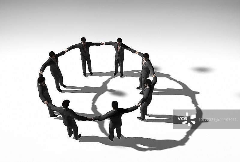 手牵手围成一圈的商人身影图片素材