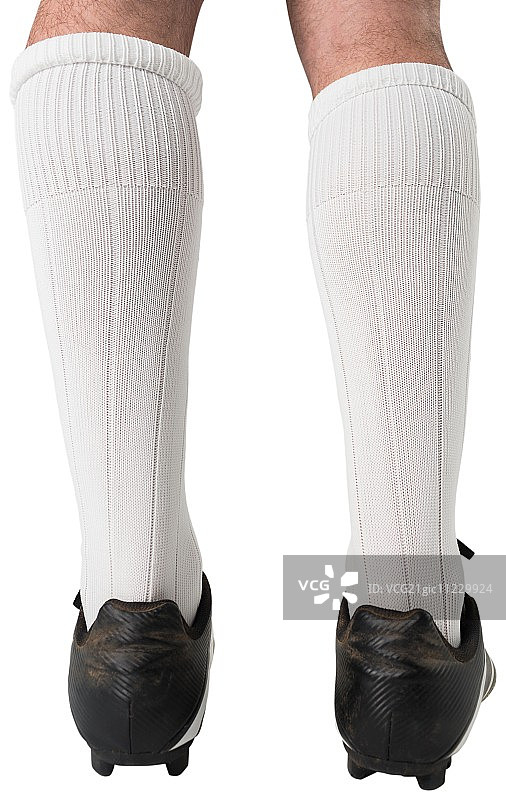 白色背景上的足球鞋特写图片素材