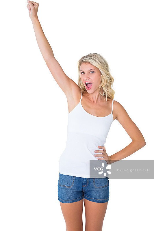 在白色背景下对着镜头欢呼的金发美女图片素材