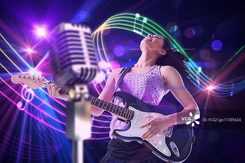 在数字音乐符号设计背景下弹吉他的漂亮女孩图片素材