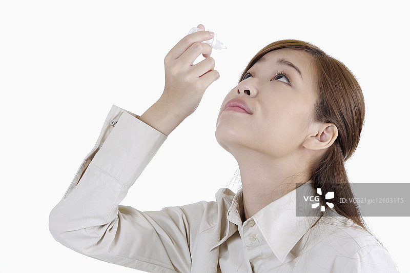 青年女人,眼药水,图片素材