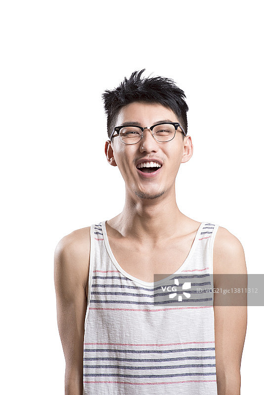 Portrait of young man laughing图片素材