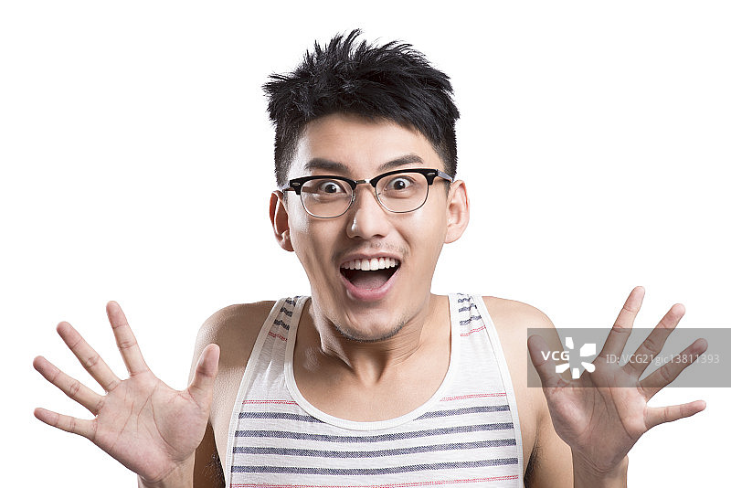 Portrait of young man surprised图片素材