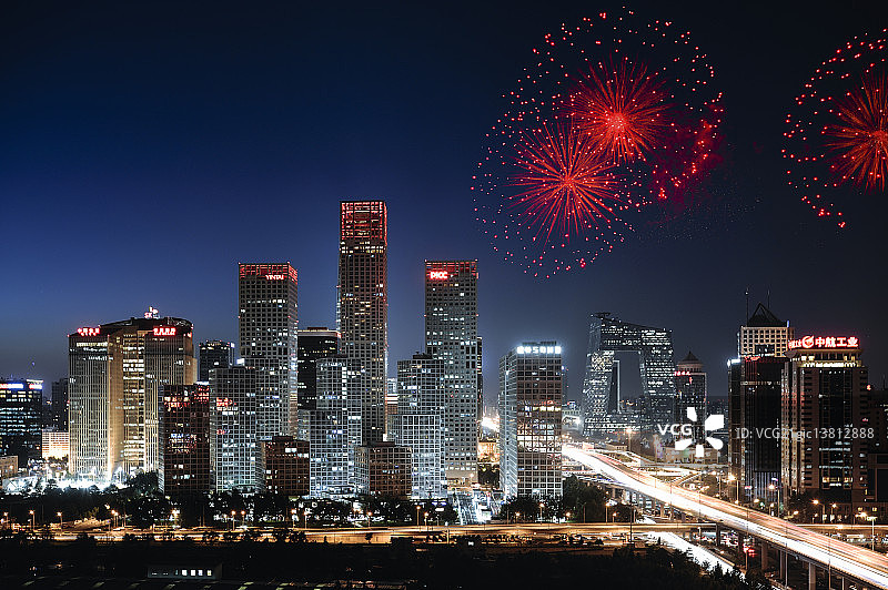 浪漫烟花下的北京CBD摩天大楼繁华夜景图片素材