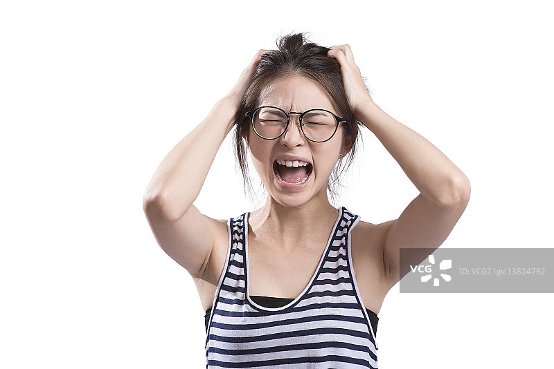 Portrait of young woman freaking out图片素材