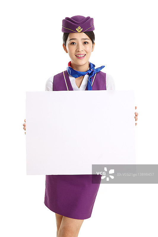 青年女乘务员拿着白板图片素材