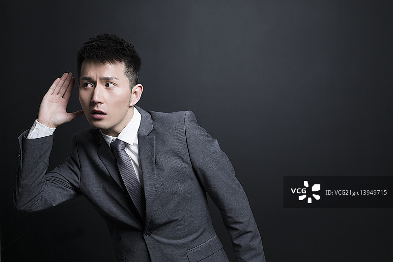 商务男士偷听图片素材