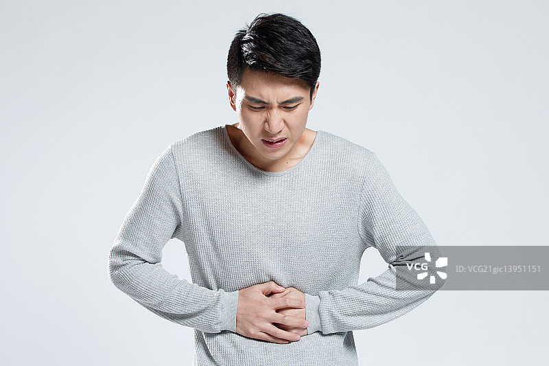 青年男人肚子疼图片素材